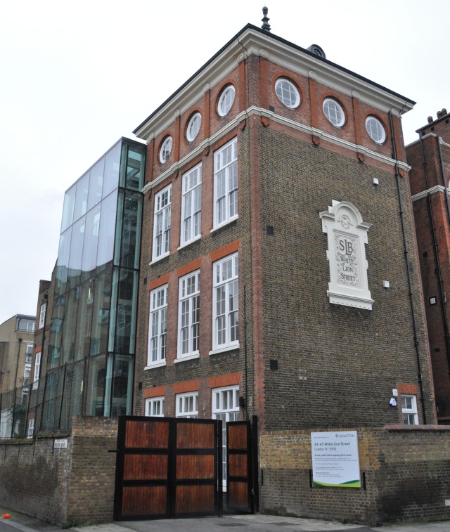 Photo of completed works - External view with glazed stair core