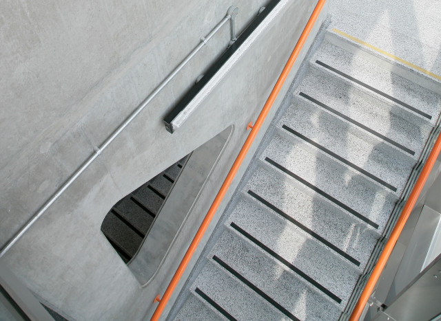 Main stair in concrete and terrazzo.