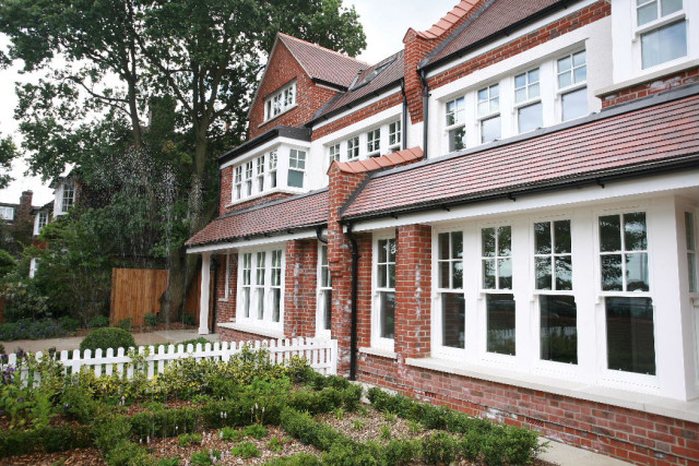 Front elevation view of two homes