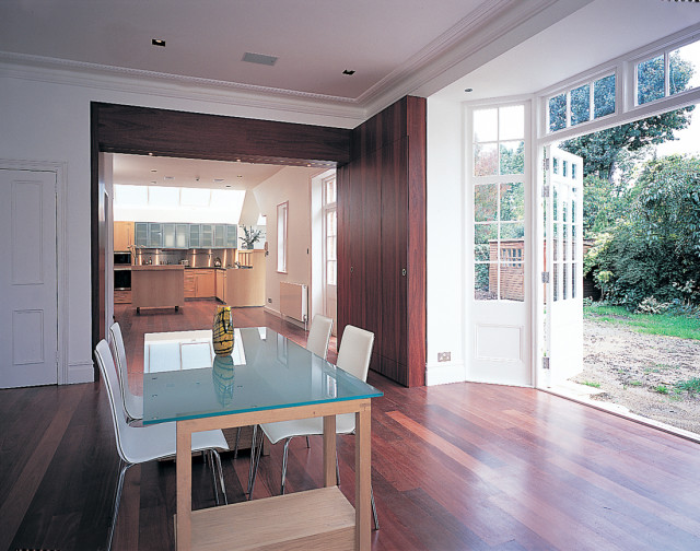 Open plan kitchen and dining area with separating doors